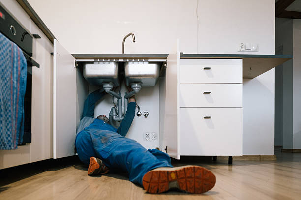 Professional Drain Cleaning technician working in Greentown, IN